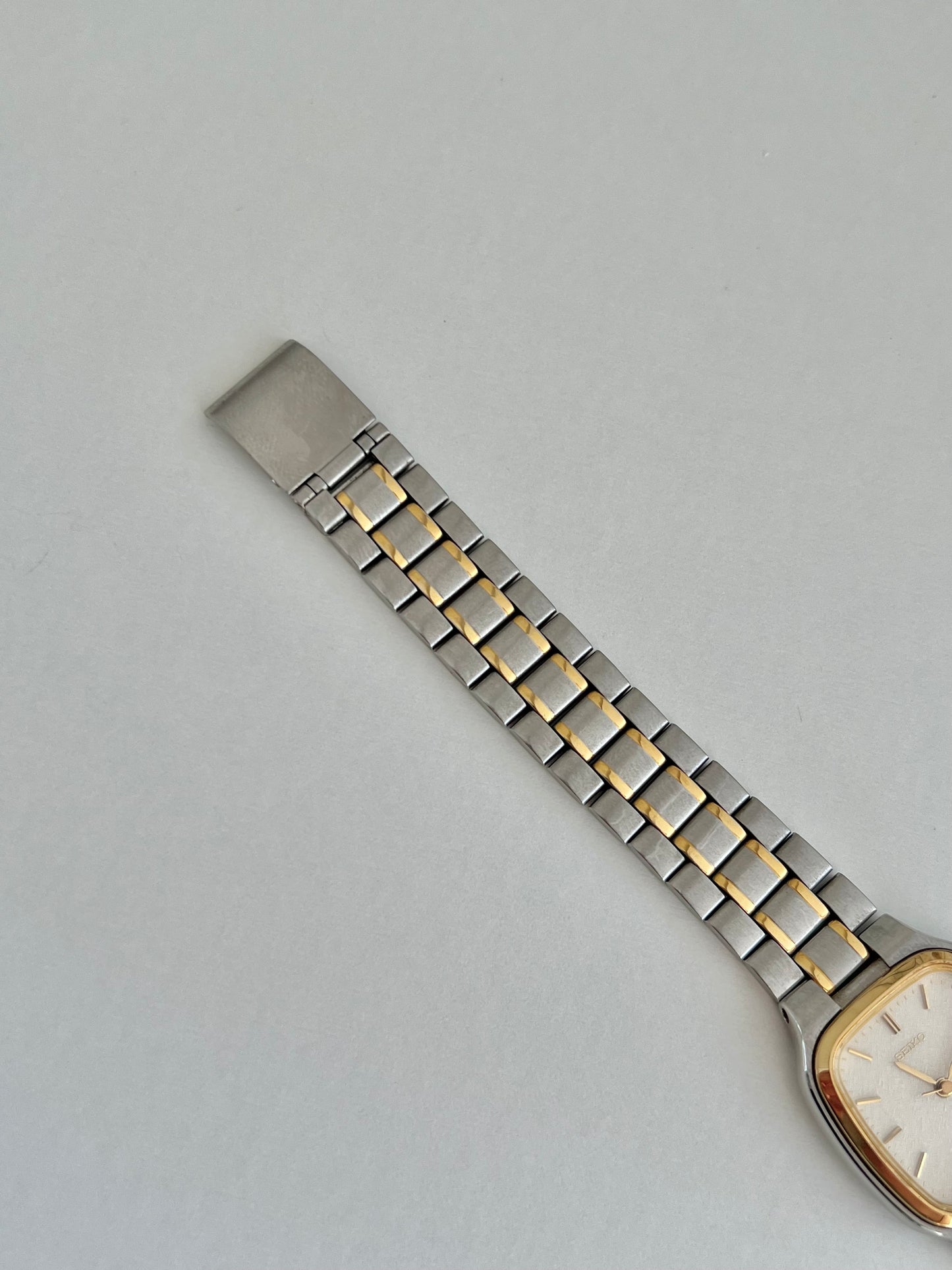 Seiko Soft Rectangular Two Toned Woman's Watch with Linen Textured Dial