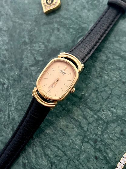 Seiko Gold Tone Oval Watch with Twin Ring Lugs
