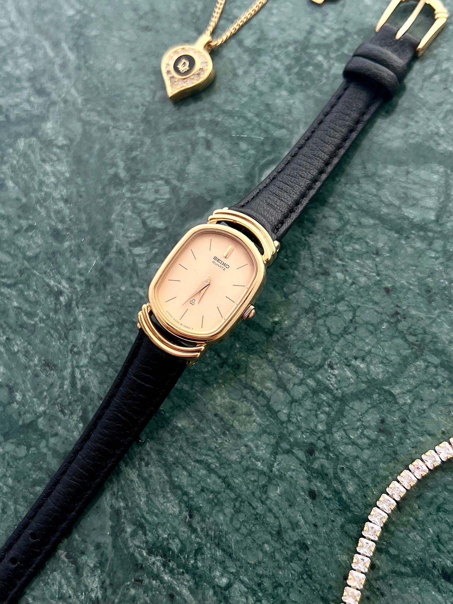 Seiko Gold Tone Oval Watch with Twin Ring Lugs
