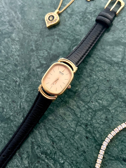 Seiko Gold Tone Oval Watch with Twin Ring Lugs