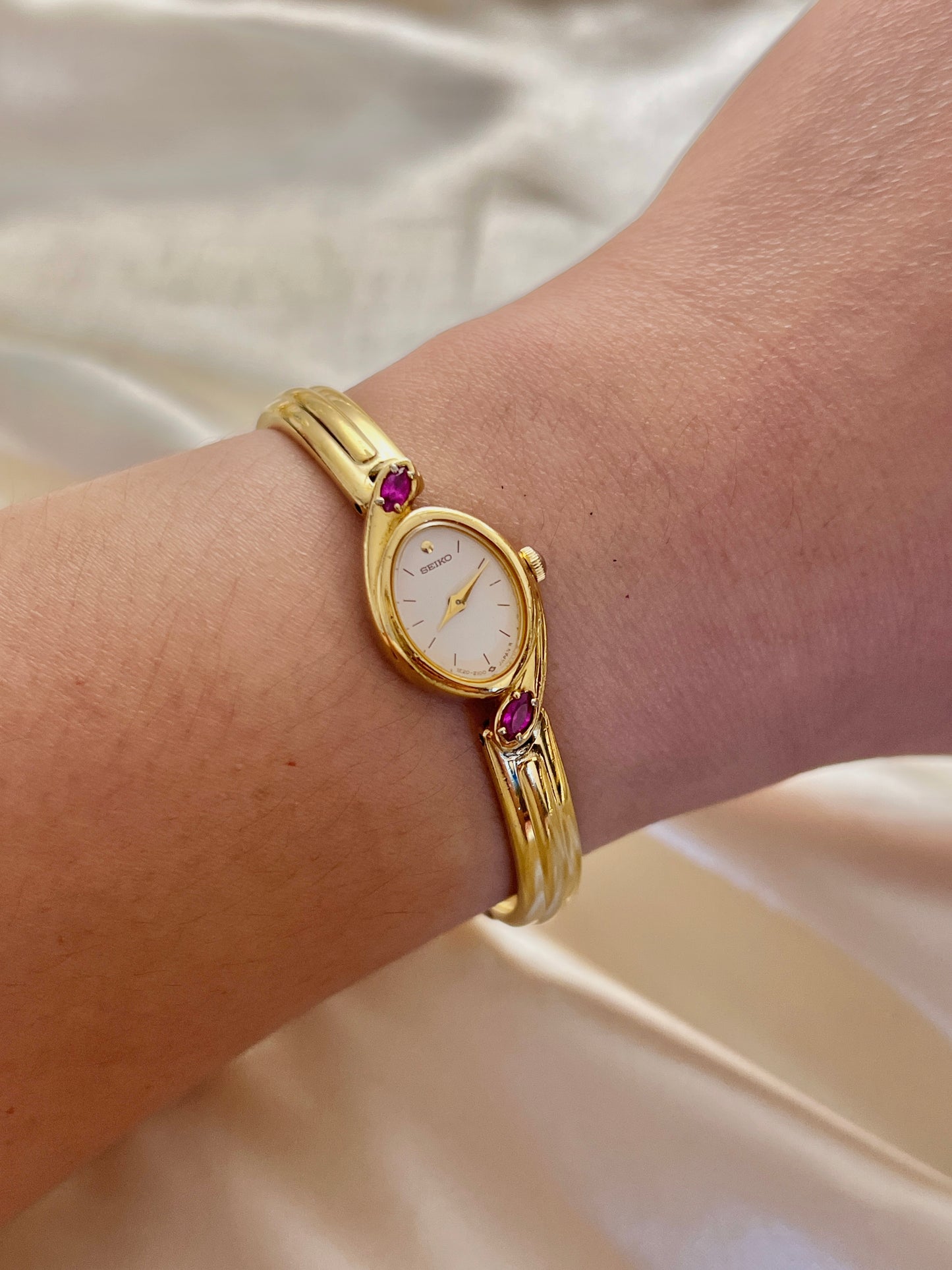Seiko Gold Bangle Watch with Rubies