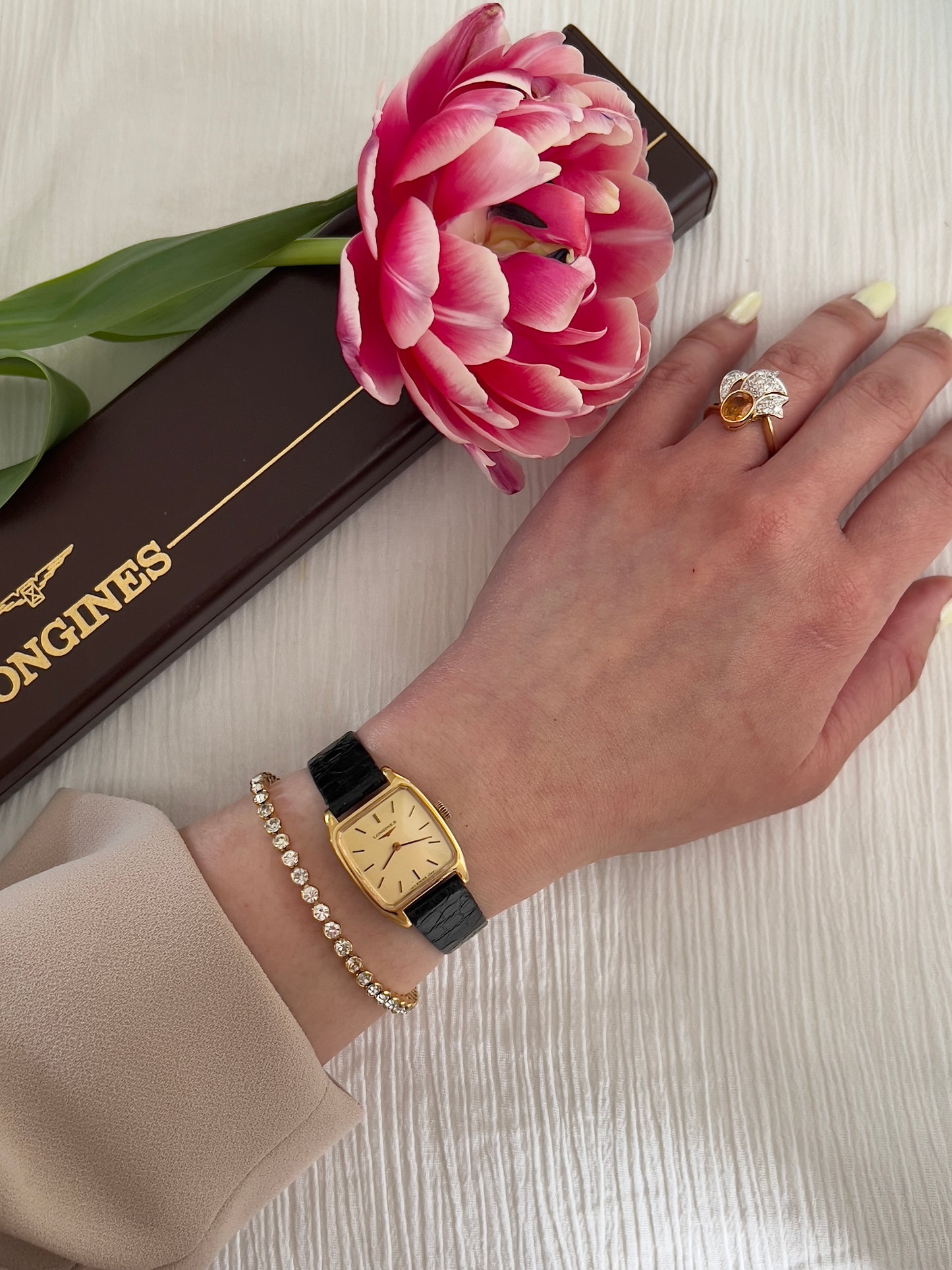 Longines Gold Tonneau Ladies Watch with Golden Dial and Black Leather Strap