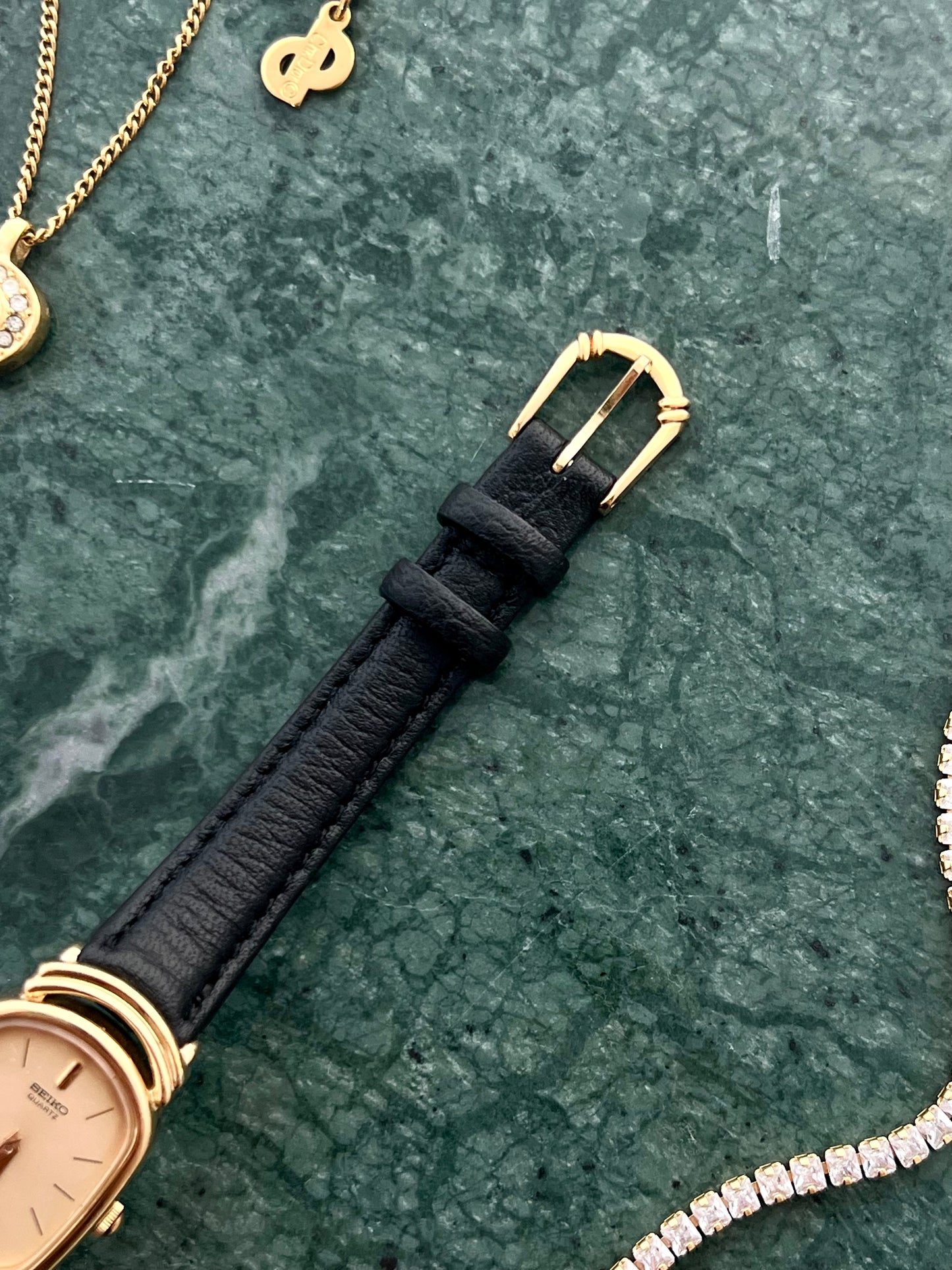 Seiko Gold Tone Oval Watch with Twin Ring Lugs