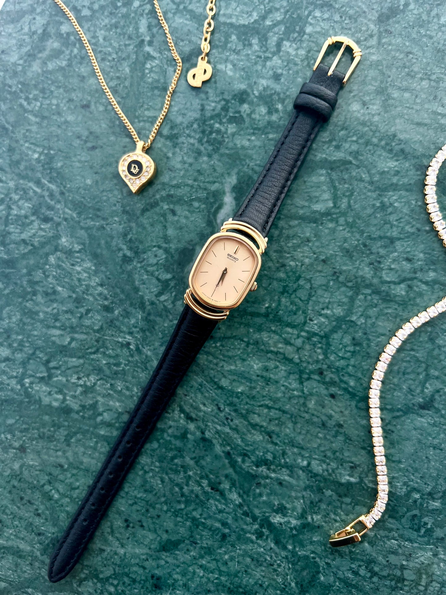 Seiko Gold Tone Oval Watch with Twin Ring Lugs