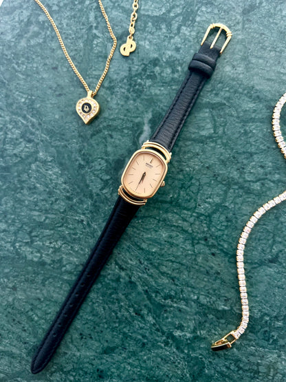 Seiko Gold Tone Oval Watch with Twin Ring Lugs