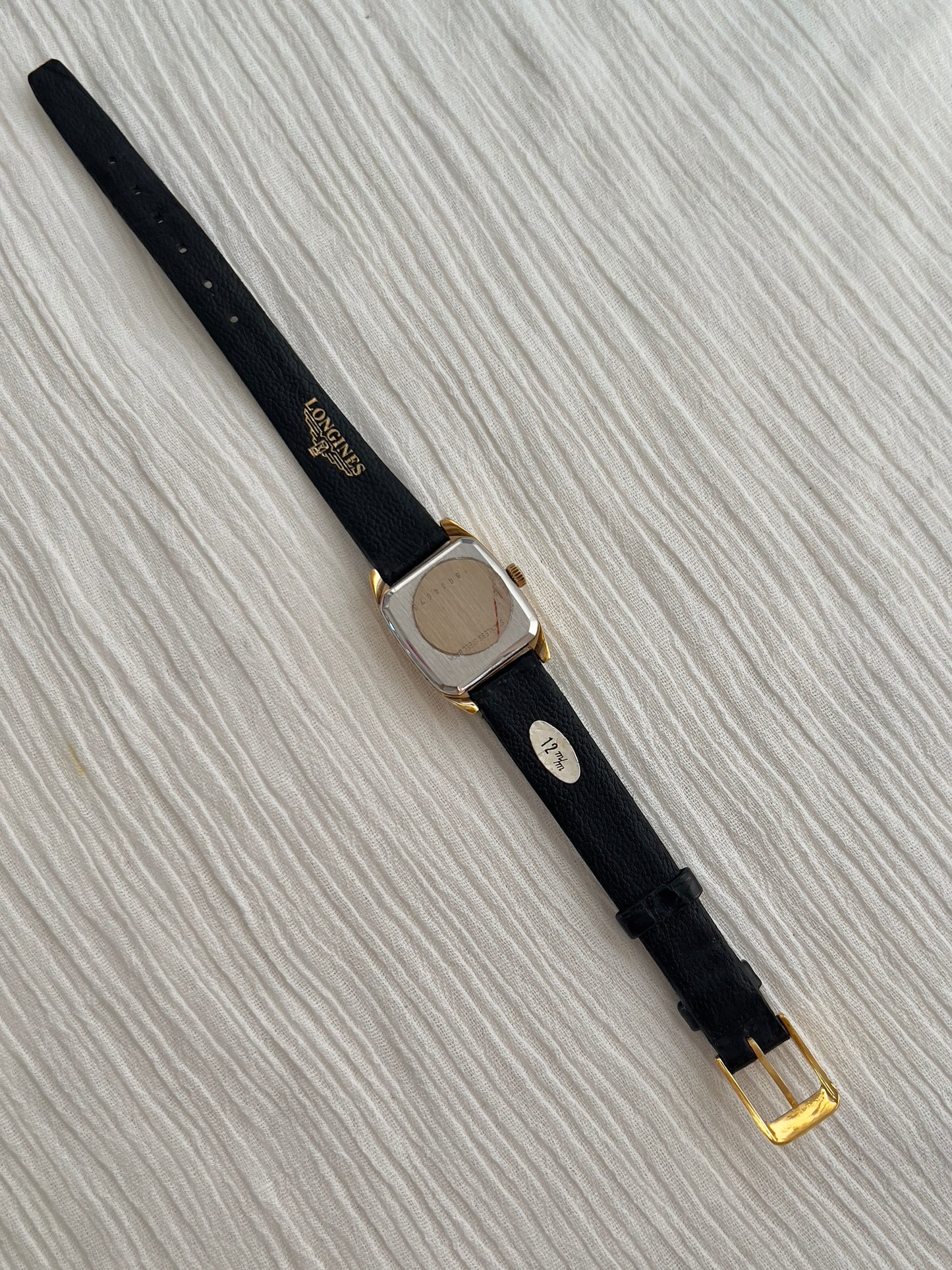 Longines Gold Tonneau Ladies Watch with Golden Dial and Black Leather Strap