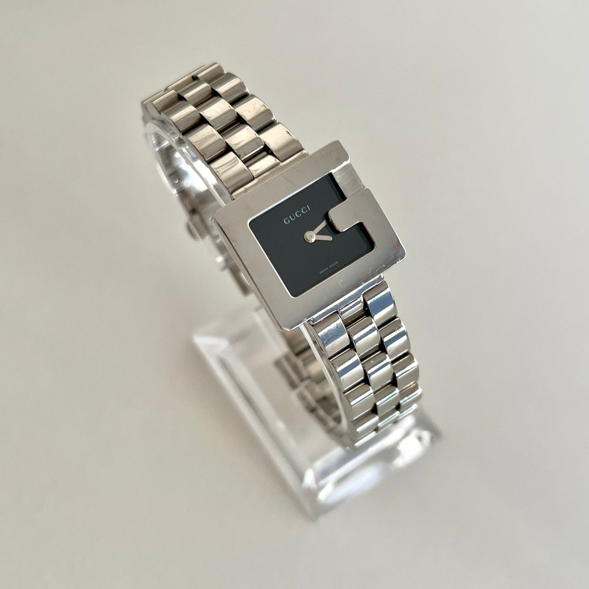 Stainless steel Gucci G Watch 3600L with black dial and G shaped case