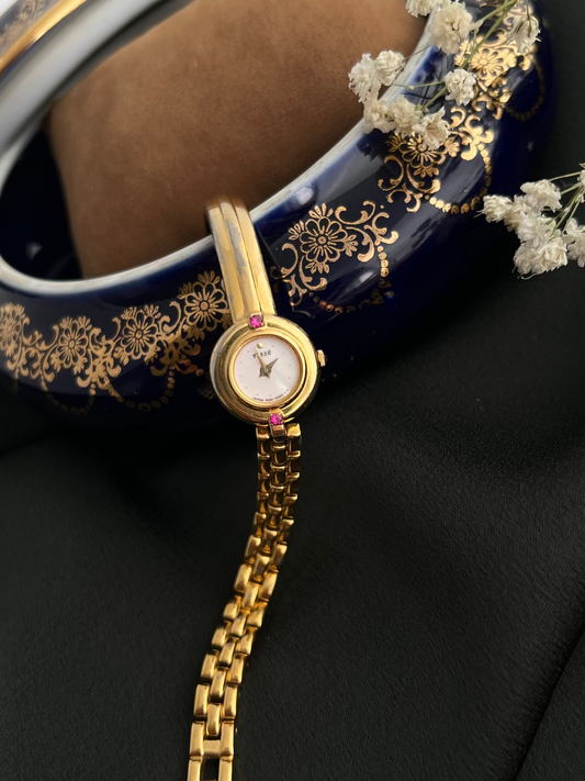 Seiko Tissé Pink Stone Accent Semi Gold Bangle Women’s Watch
