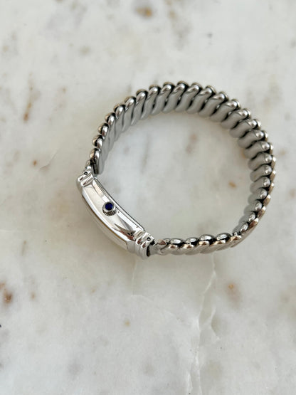 Hamilton Benton Silver Sculpted Watch: side profile showing blue crown accent.