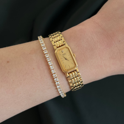 Seiko Champagne Dial Sculpted Gold Bracelet Women’s Watch