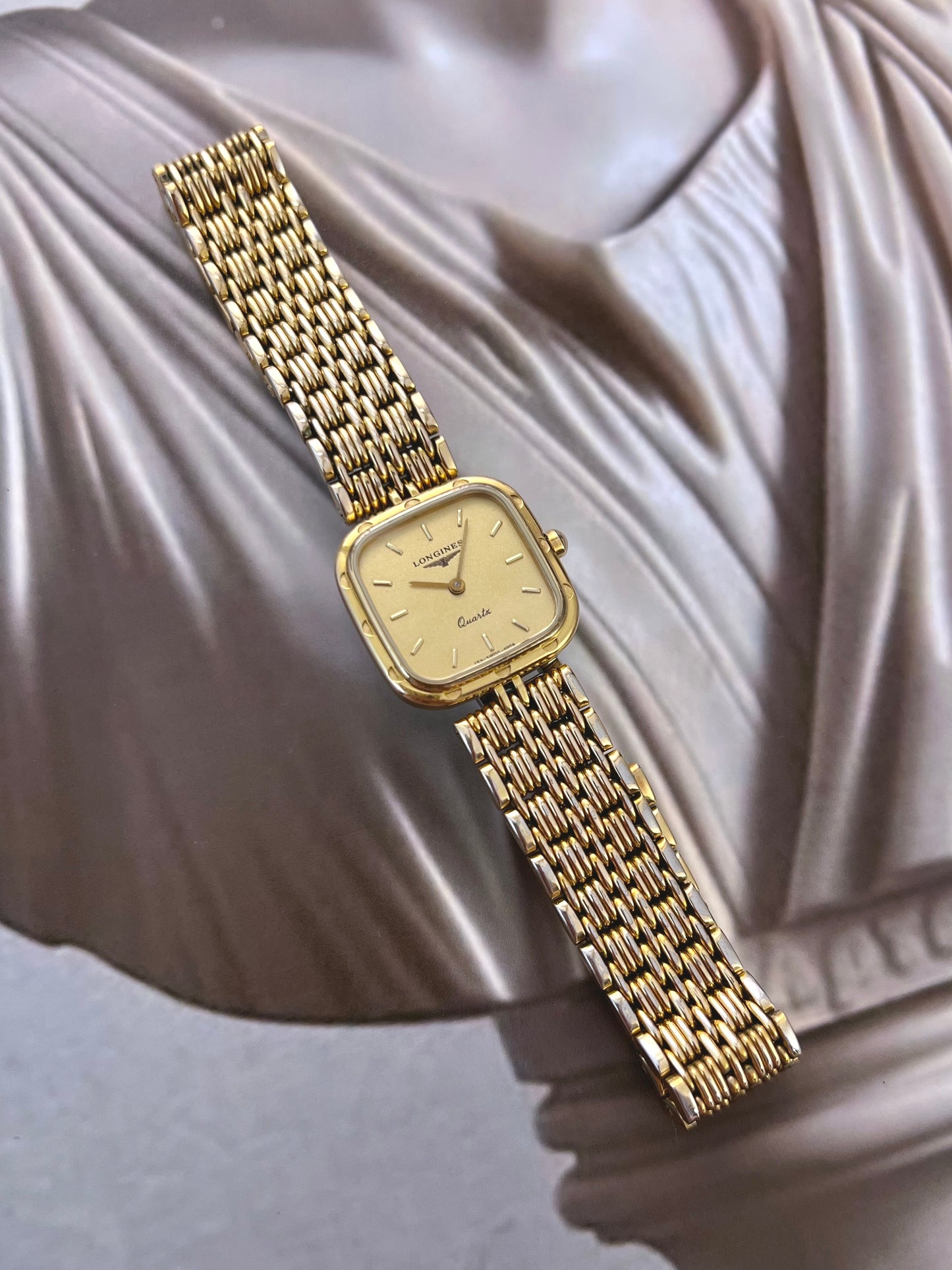 Longines Dimple Bezel Gold Weave Women’s Watch