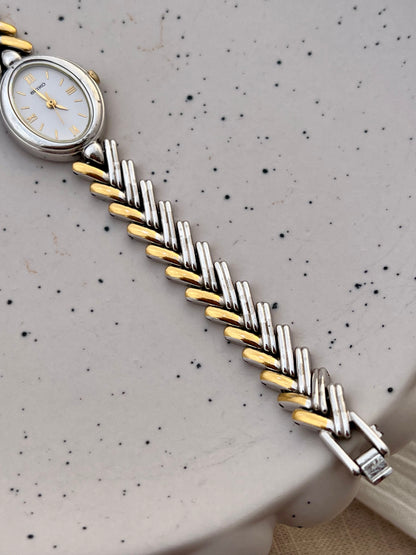Seiko Ladies Two Tone Oval Herringbone Bracelet Watch