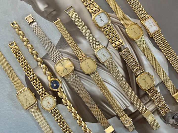 Omega De Ville gold women's watch with Milanese mesh bracelet