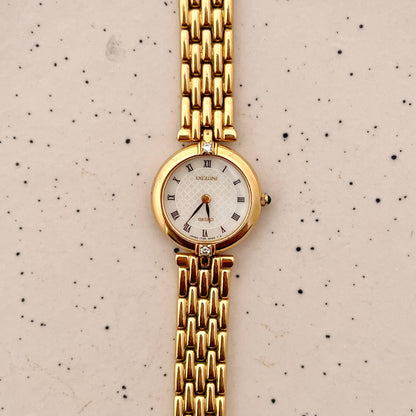 Gold Seiko Exceline Woman's watch with a guilloche dial, diamonds.