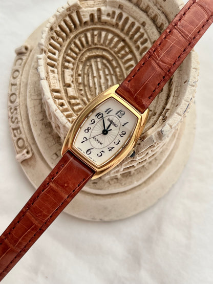 Seiko Exceline Gold Tonneau with Guilloche Oval Dial Women's Watch
