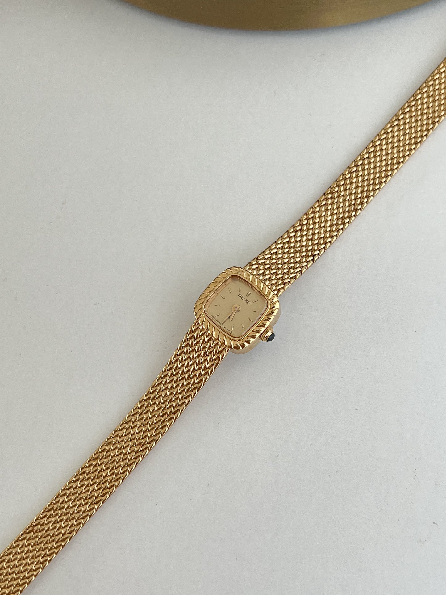 Seiko Mini Rope Bezel Cushioned Women's Watch in Gold Tone