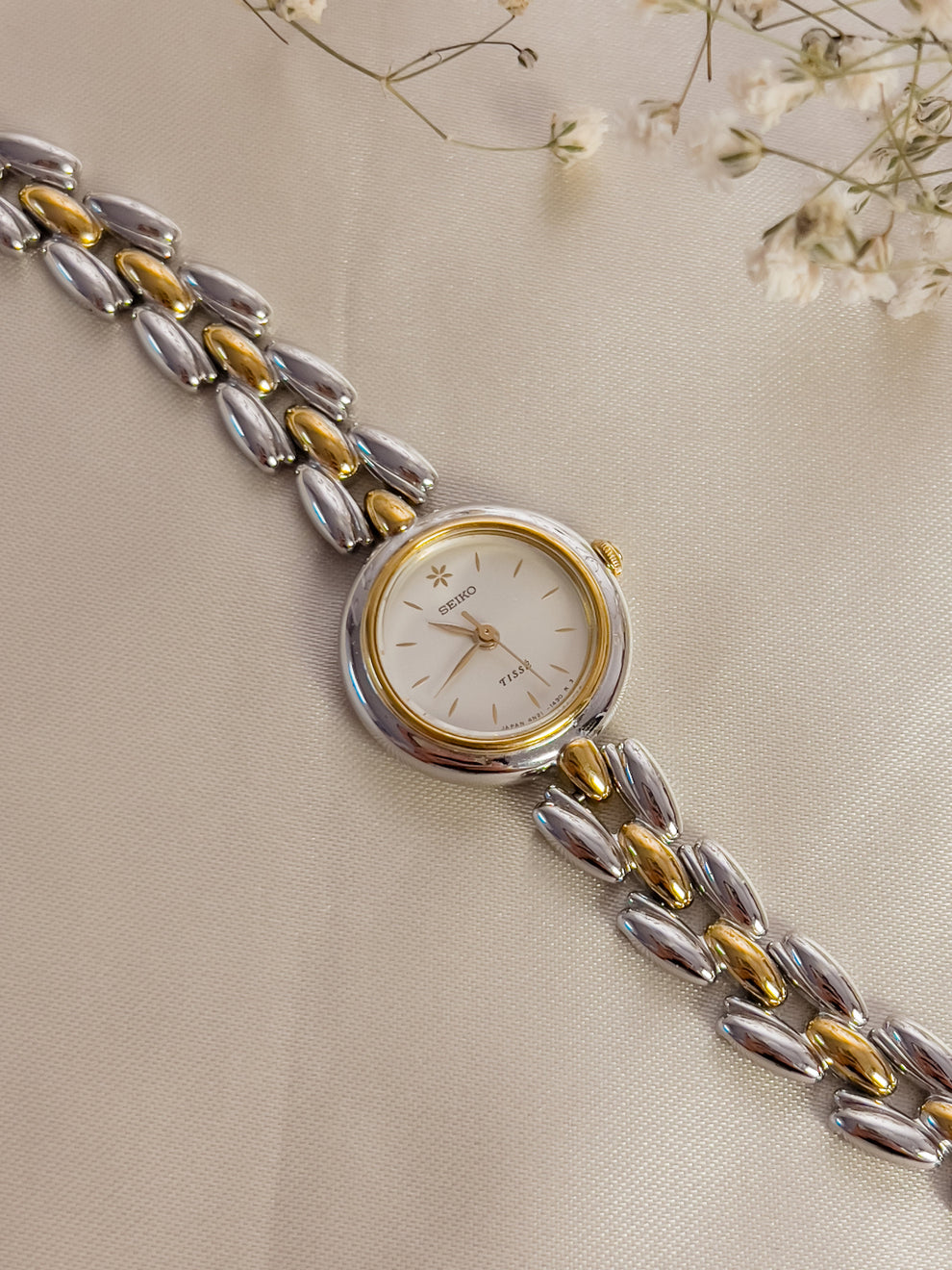 Two tone Seiko Tisse with white dial and flower detail
