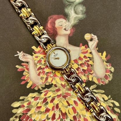 Vintage-style advertisement with a woman in a floral dress and gold watch, featuring the brand 'Achou Lajaunie'.