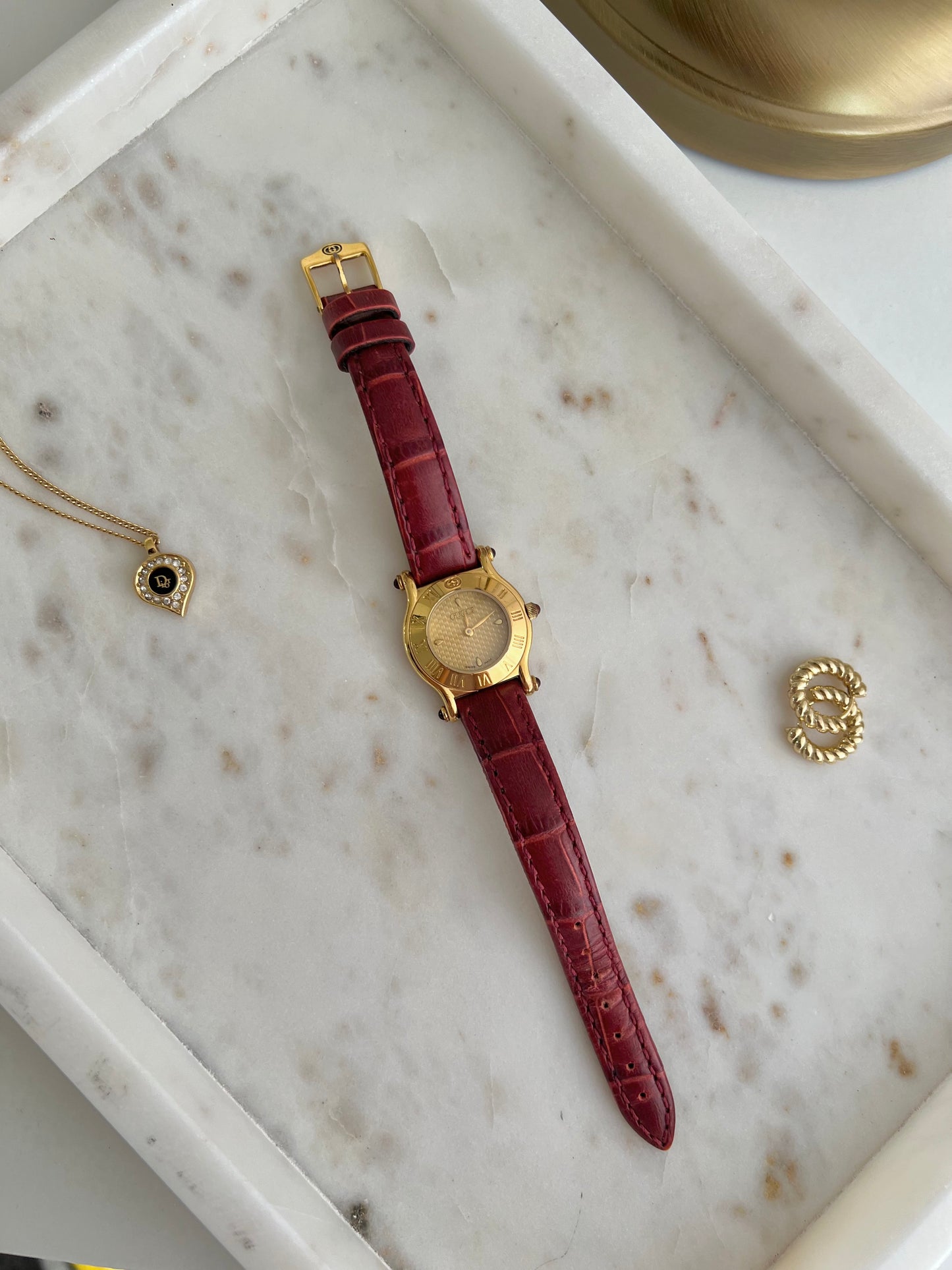 Gucci Gold Toned Ladies Watch with Roman Bezel and Textured Dial