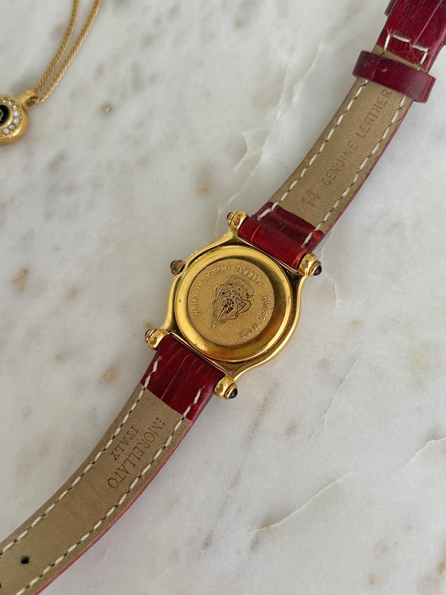 Gucci Gold Toned Ladies Watch with Roman Bezel and Textured Dial