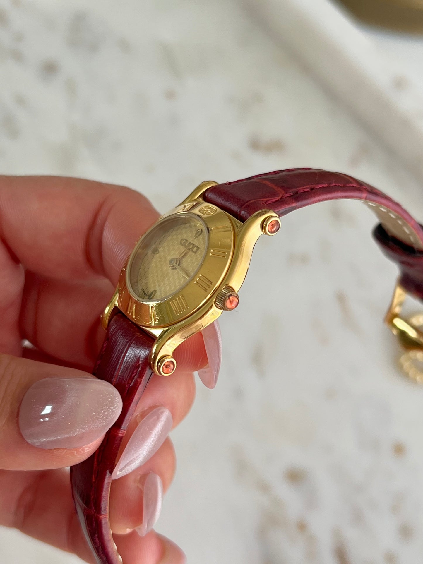 Gucci Gold Toned Ladies Watch with Roman Bezel and Textured Dial