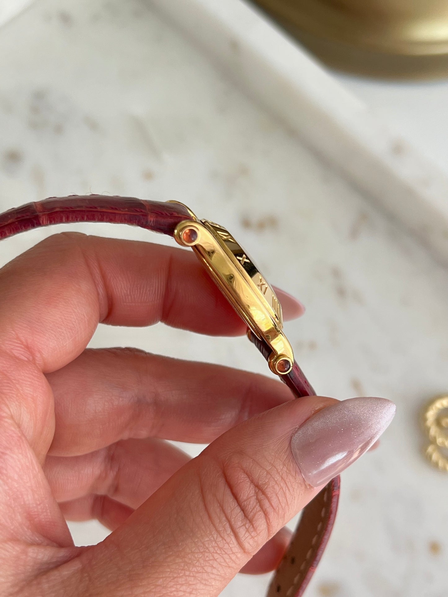 Gucci Gold Toned Ladies Watch with Roman Bezel and Textured Dial