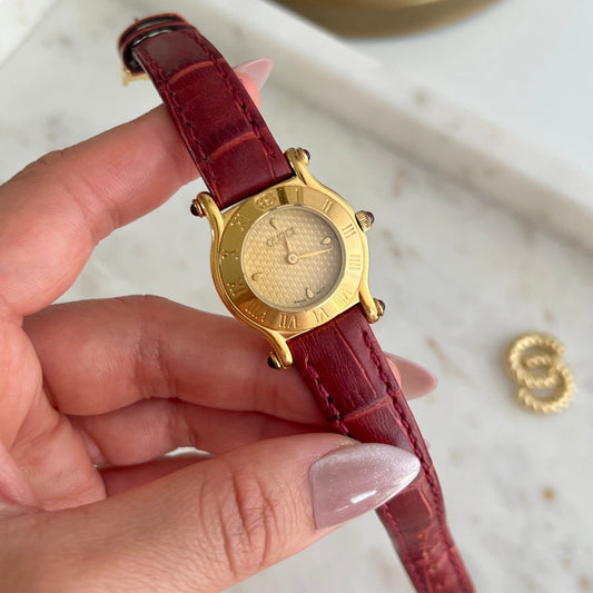 Gucci Gold Toned Ladies Watch with Roman Bezel and Textured Dial