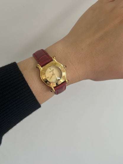 Gucci Gold Toned Ladies Watch with Roman Bezel and Textured Dial
