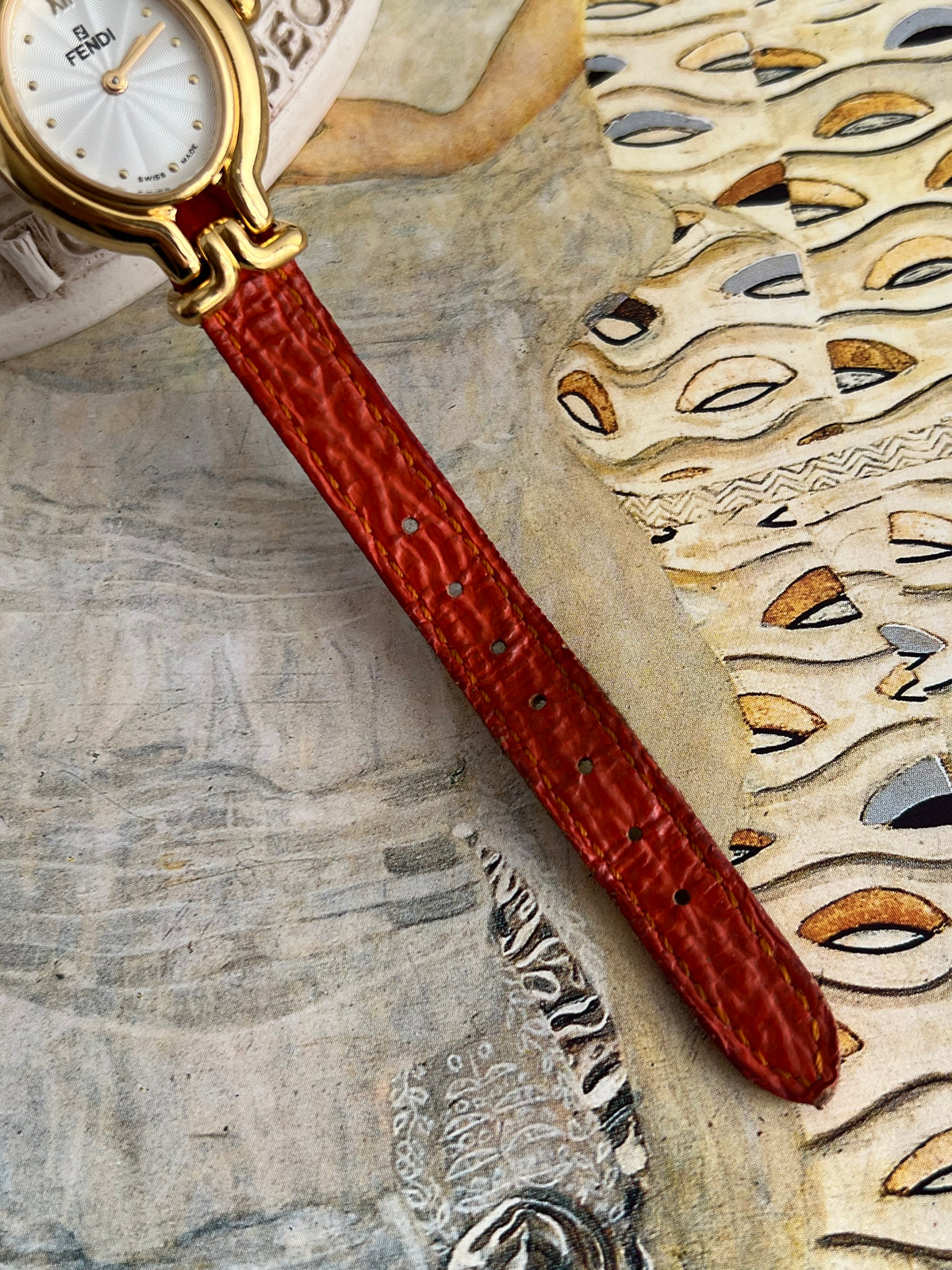 Fendi Chameleon Gold Oval Orange Strap Women’s Watch