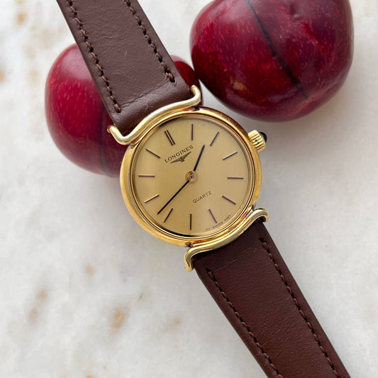 Longines Gold Tone Round Curved Lugs Womens Watch