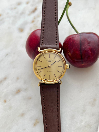 Longines Gold Tone Round Curved Lugs Womens Watch