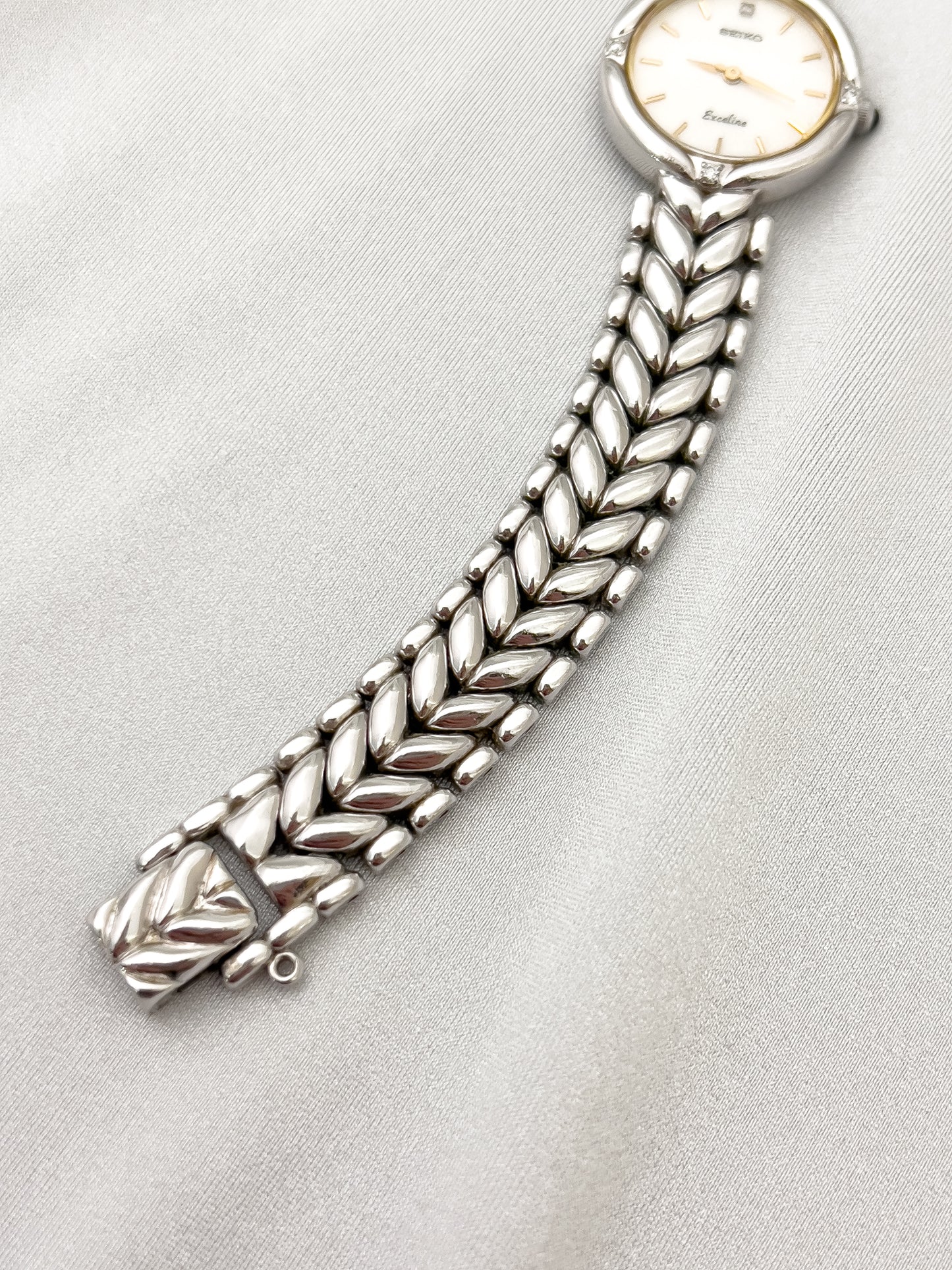 Seiko Exceline Woman's Watch with Diamonds and Sculpted Pattern Bracelet