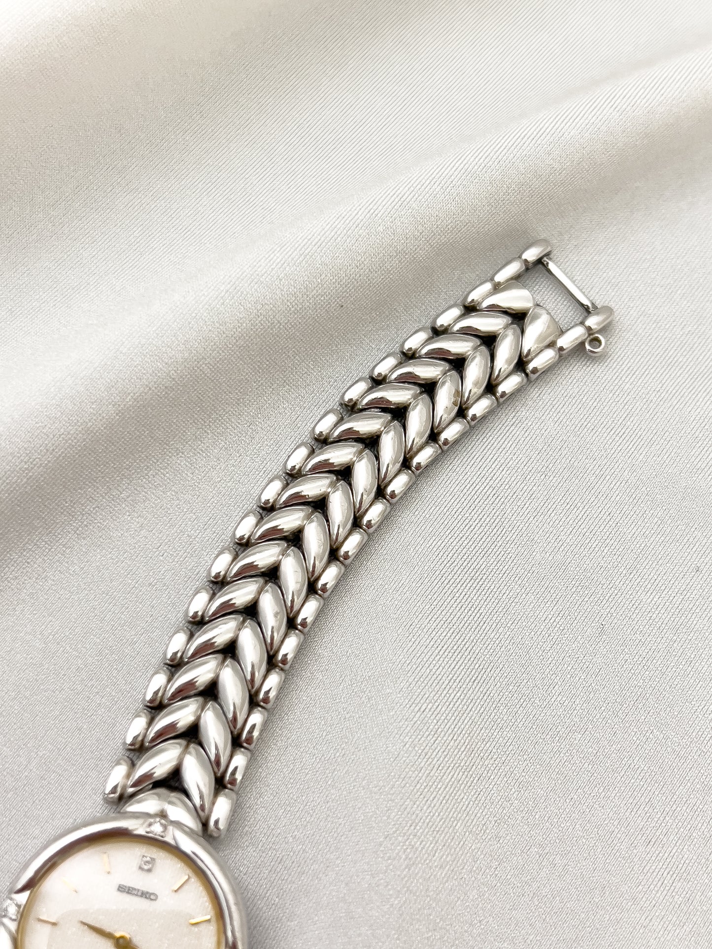 Seiko Exceline Woman's Watch with Diamonds and Sculpted Pattern Bracelet