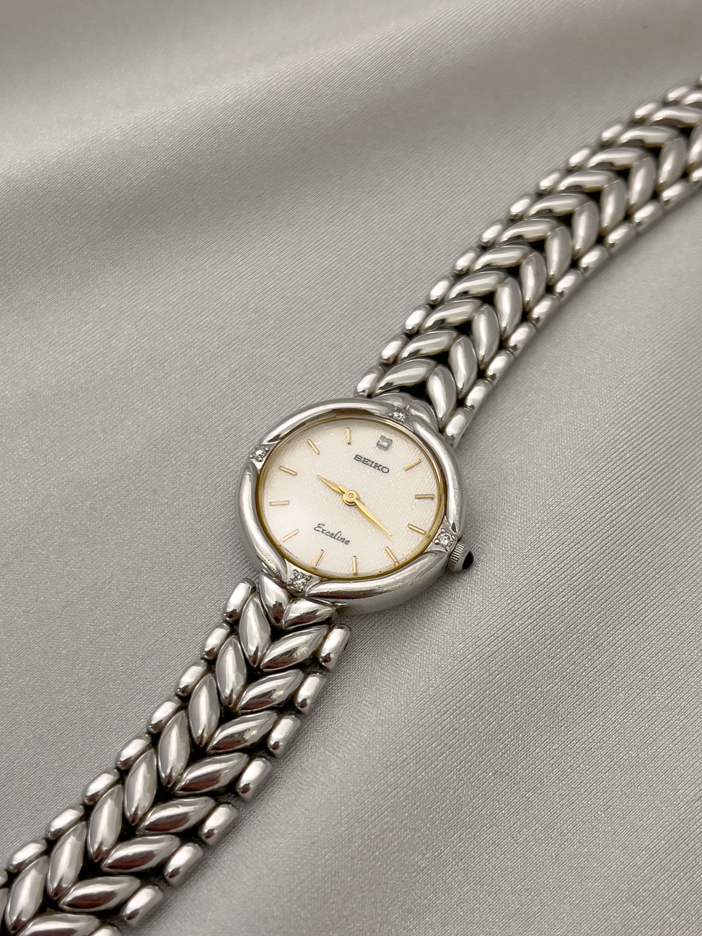 Seiko Exceline Woman's Watch with Diamonds and Sculpted Pattern Bracelet