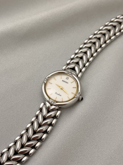 Seiko Exceline Woman's Watch with Diamonds and Sculpted Pattern Bracelet