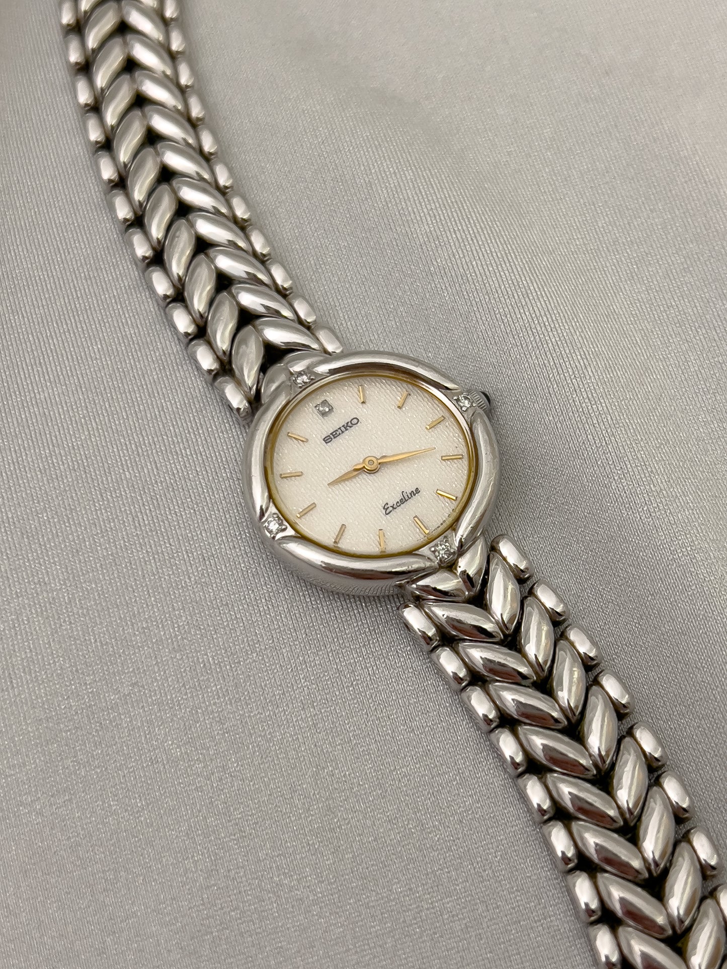 Seiko Exceline Woman's Watch with Diamonds and Sculpted Pattern Bracelet
