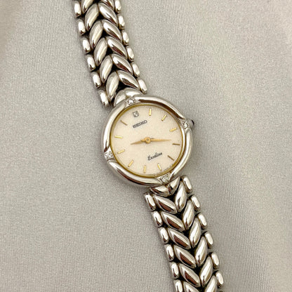 Seiko Exceline Woman's Watch with Diamonds and Sculpted Pattern Bracelet
