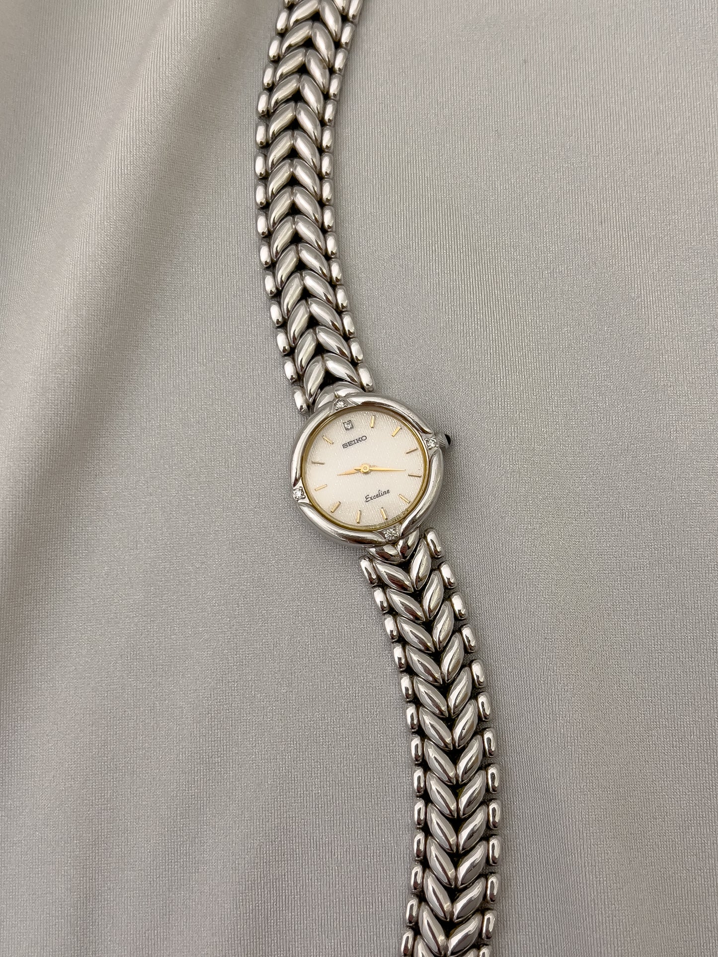 Seiko Exceline Woman's Watch with Diamonds and Sculpted Pattern Bracelet