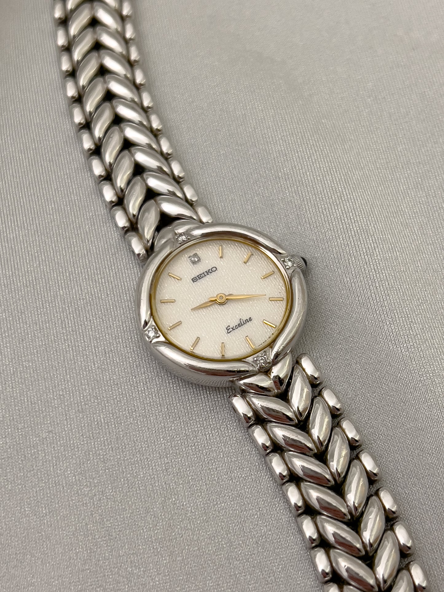 Seiko Exceline Woman's Watch with Diamonds and Sculpted Pattern Bracelet