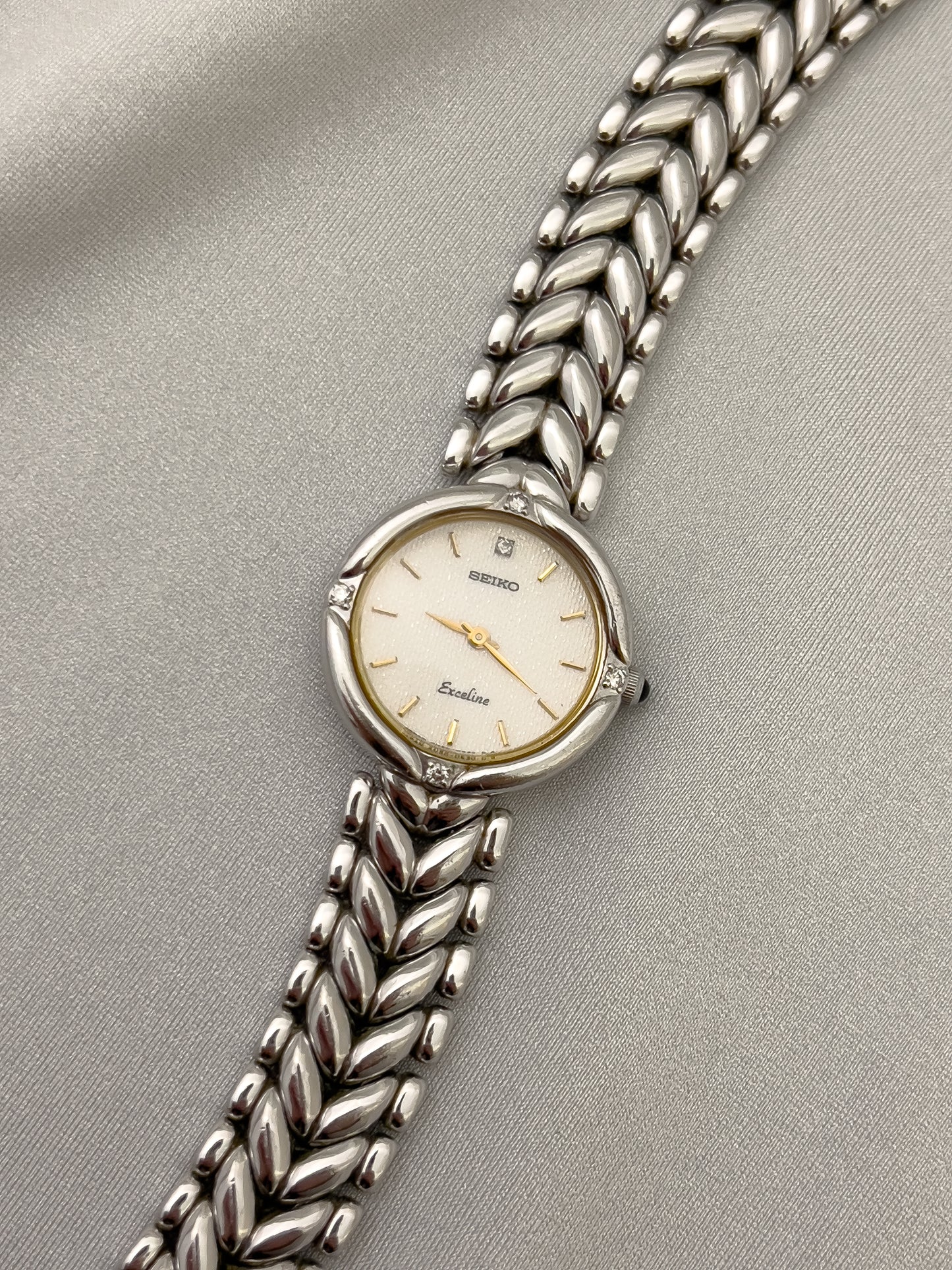 Seiko Exceline Woman's Watch with Diamonds and Sculpted Pattern Bracelet