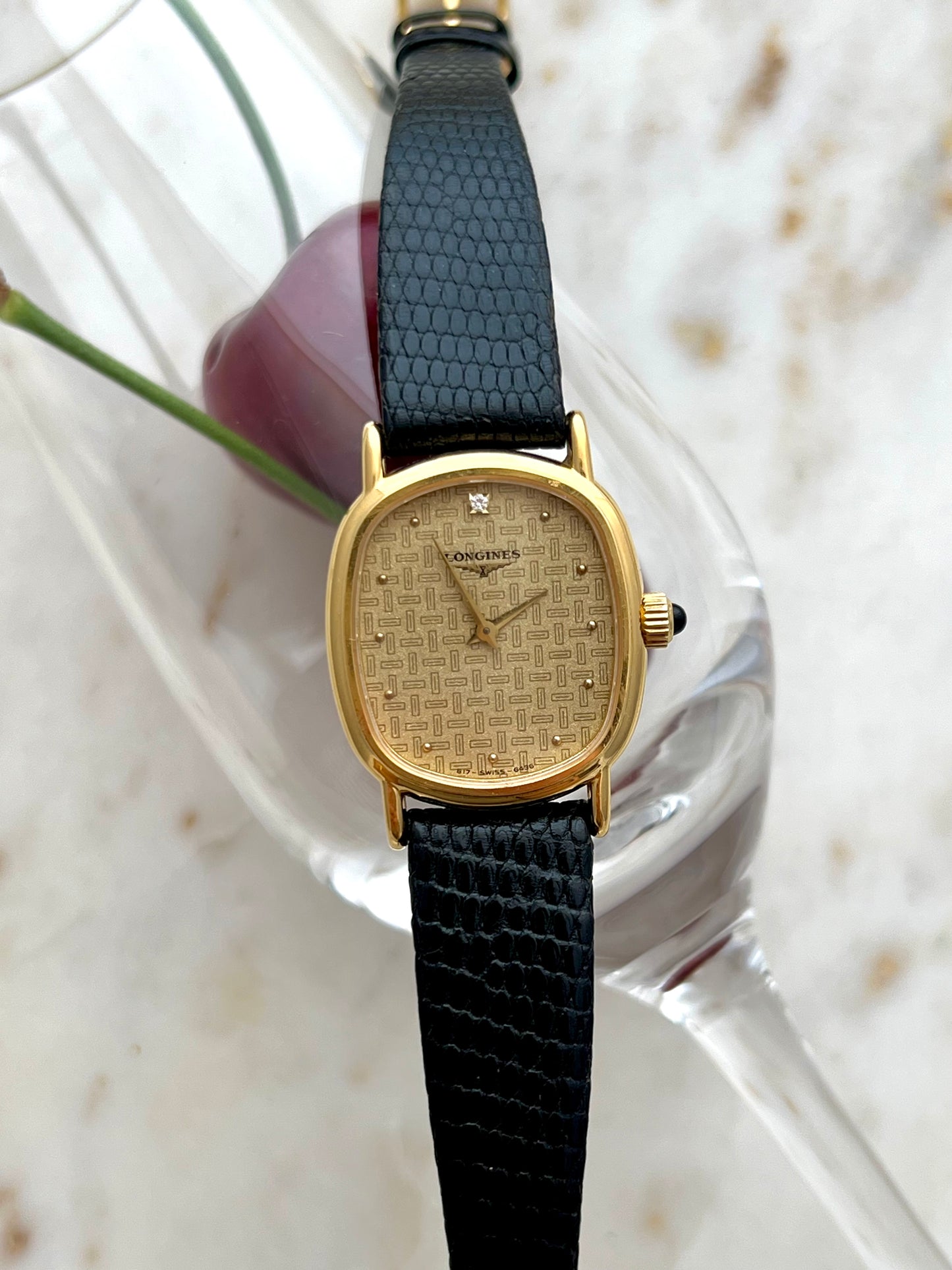 Longines Oblong Gold Tone Woman's Watch with Solitaire Diamond & Patterned Dial