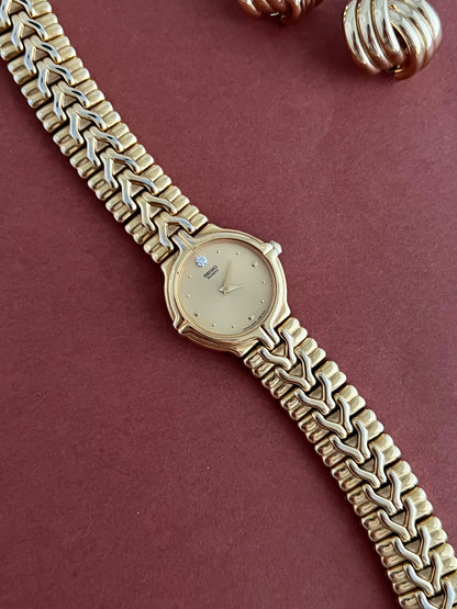 Seiko Woman's Watch Gold with Chevron Pattern Bracelet