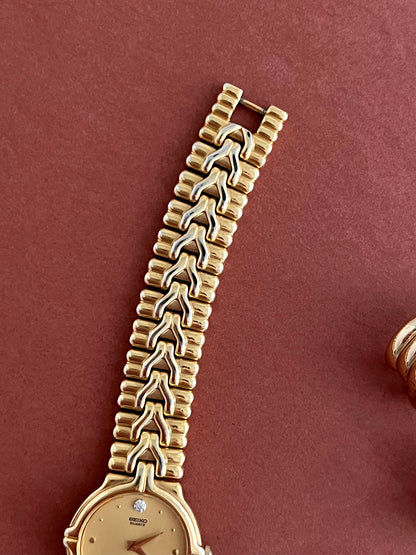 Seiko Woman's Watch Gold with Chevron Pattern Bracelet