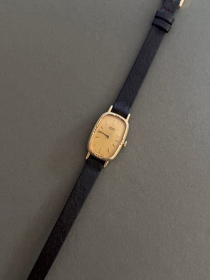 Seiko Gold Toned Woman's Watch with Champagne Dial