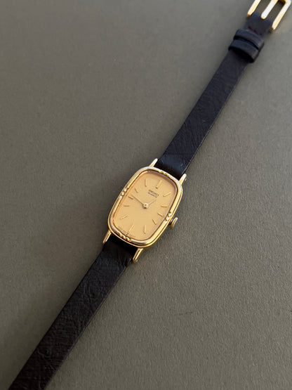 Seiko Gold Toned Woman's Watch with Champagne Dial