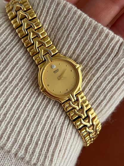 Seiko Woman's Watch Gold with Chevron Pattern Bracelet