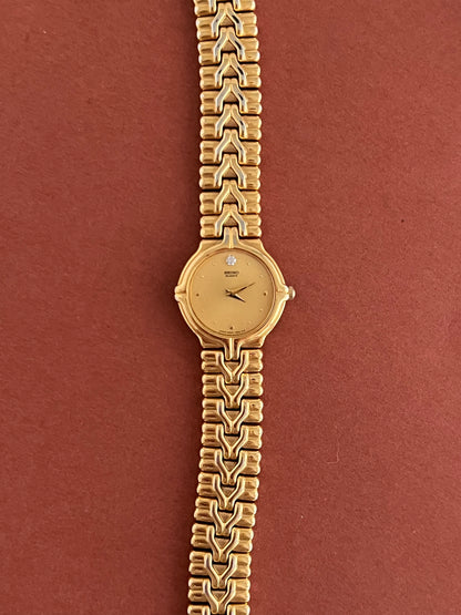 Seiko Woman's Watch Gold with Chevron Pattern Bracelet