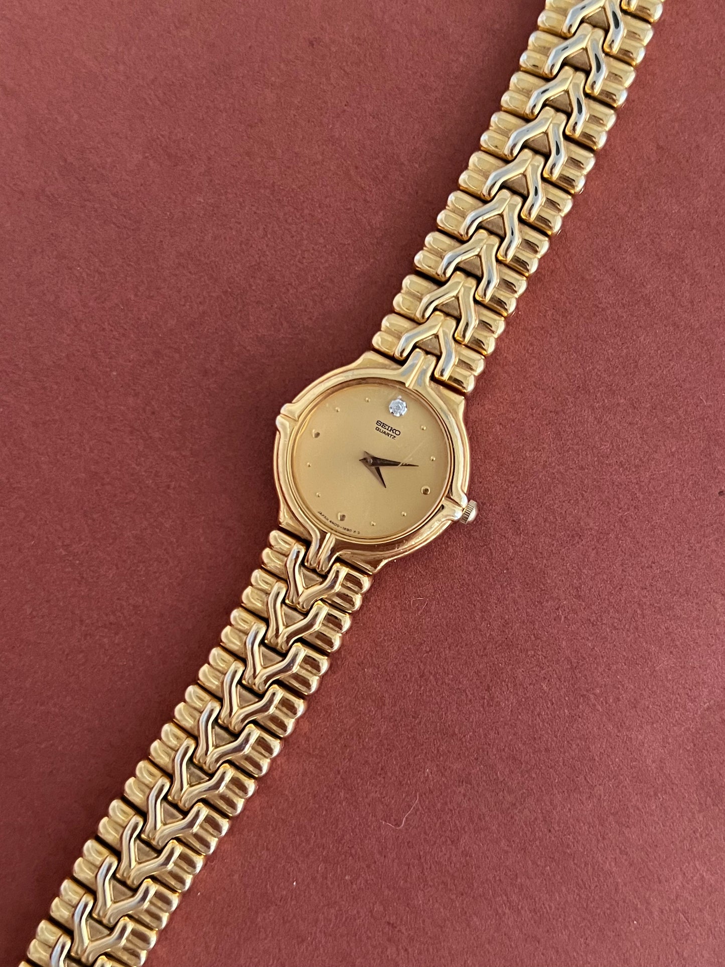 Seiko Woman's Watch Gold with Chevron Pattern Bracelet