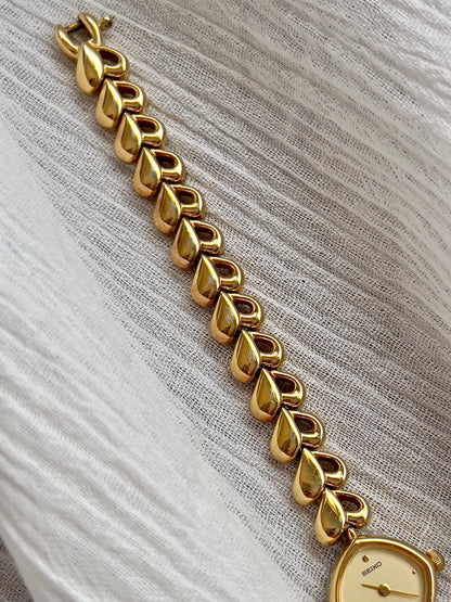 Seiko Gold Toned Women's Watch with Hearts Bracelet