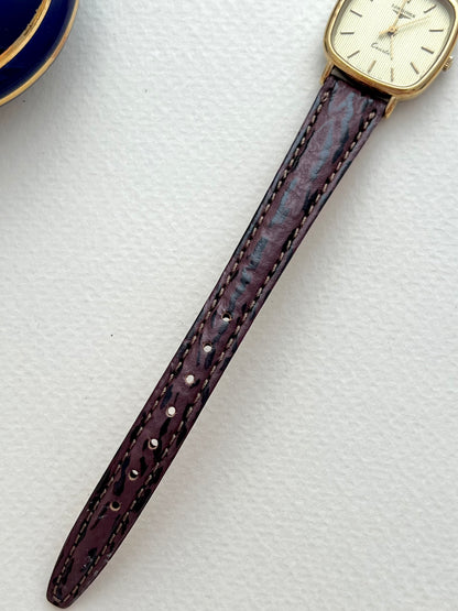 Longines Gold Toned Cushion Case Stripe Dial Woman's Watch